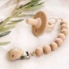 The Frenchie Knot Wood Beaded Pacifier Clip